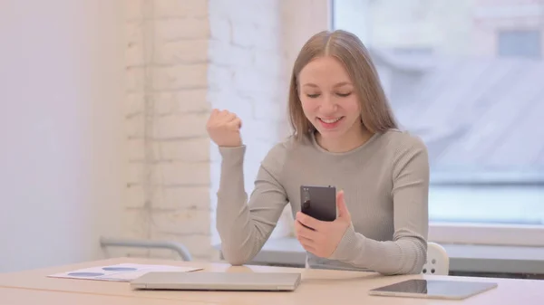 Successful Creative Young Woman Celebrating Win Smartphone — Stockfoto