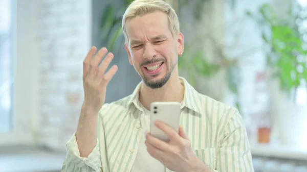 Shocked Modern Young Man Facing Loss Smartphone — Stockfoto