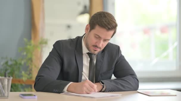 Young Businessman Writing Letter Work Paperwork — Stock Video