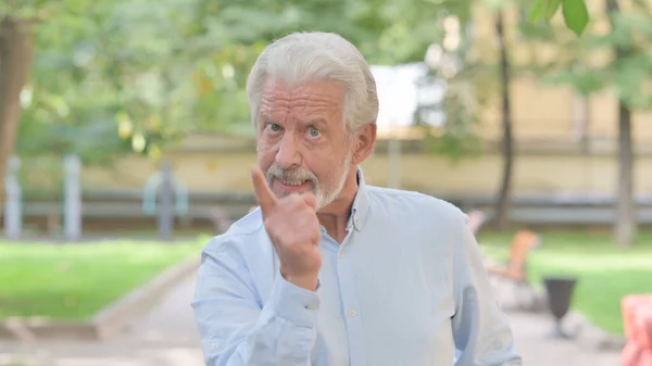 Outdoor Portrait of Angry Senior Old Man Arguing and Fighting