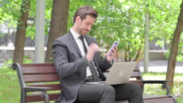 Young Businessman Working Laptop Smartphone — Stock Video