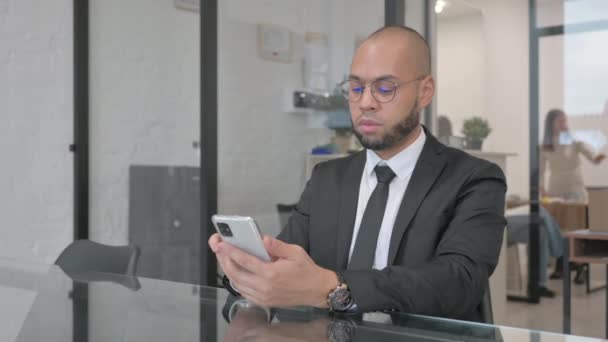Mixed Race Businessman Celebrating Success Phone — Stock Video