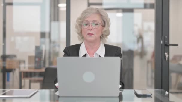 Coughing Senior Businesswoman Using Laptop — Stock Video