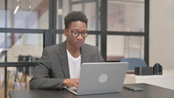 African American Man Celebrating Success Laptop — ストック動画