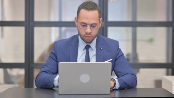 Coughing Mixed Race Businessman Working Laptop — Stock Video