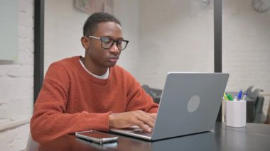 African American Man Working on Laptop
