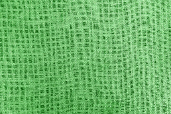 帆布上有真麻线的绿色帆布纹理 帆布上有漂亮的亚麻布纹理 作为绿色麻布帆布的样品 — 图库照片