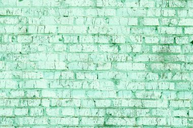 Yeşil tuğlalardan yapılmış olağandışı yeşil tuğlalar ve soyut yeşil arkaplan için kırılmış yeşil tuğlalar olan tuğla duvar.