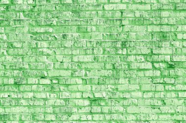 Yeşil tuğlalardan yapılmış olağandışı yeşil tuğlalar ve soyut yeşil arkaplan için kırılmış yeşil tuğlalar olan tuğla duvar.