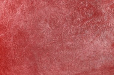 Beautiful red background with leather texture with red veins of red leather background as sample of red background from natural leather or sample of texture of leather for beautiful natural background