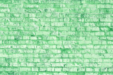Yeşil tuğlalardan yapılmış olağandışı yeşil tuğlalar ve soyut yeşil arkaplan için kırılmış yeşil tuğlalar olan tuğla duvar.