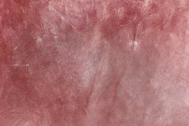Beautiful red background with leather texture with red veins of red leather background as sample of red background from natural leather or sample of texture of leather for beautiful natural background