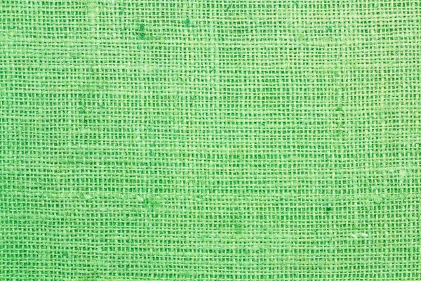 Green canvas texture with real linen threads on canvas with beautiful linen texture on canvas as sample of green linen canvas