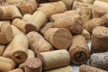 KIEV  UKRAINE - FEBRUARY, 18, 2023: Wine corks editorial background with dates and drops of wine on February 18, 2023 in Kiev, Ukraine