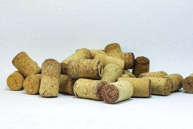 Abstract background of wine corks with corks from red wine bottles and corks from white wine bottles among other wine corks