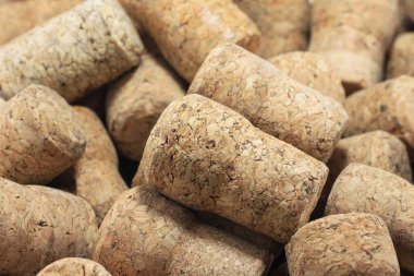 Abstract background of wine corks with corks from red wine bottles and corks from white wine bottles among other wine corks
