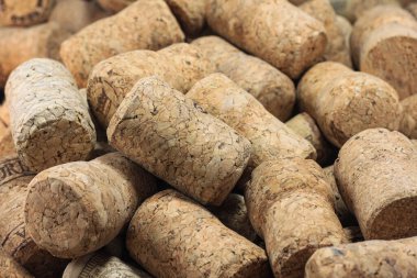 KYIV  UKRAINE - FEBRUARY, 18, 2023: Wine corks editorial background with dates and drops of wine on February 18, 2023 in Kyiv, Ukraine