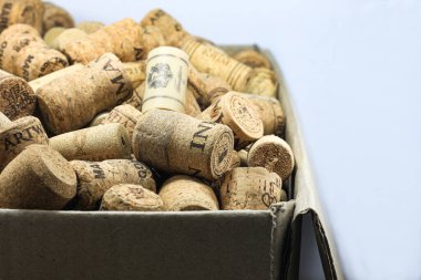 KYIV  UKRAINE - FEBRUARY, 18, 2023: Wine corks editorial background with dates and drops of wine on February 18, 2023 in Kyiv, Ukraine