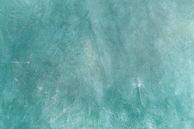 Yeşil deri damarları olan yeşil derili güzel yeşil arkaplan doğal deriden yeşil arkaplan örneği ya da güzel doğal arkaplan için deri dokusu örneği.