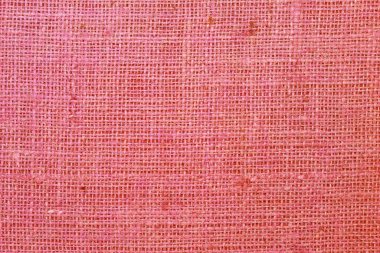 Kırmızı çuval bezi, güzel bez kumaş dokusu ve güzel çuval bezi rengi ve güzel çuval bezi rengi arkaplan olarak güzel kırmızı kumaş bezi dokusu ile retro tarzı.