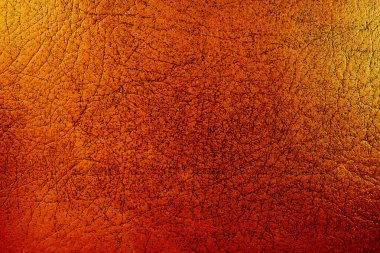 Beautiful red background with leather texture with red veins of red leather background as sample of red background from natural leather or sample of texture of leather for beautiful natural background