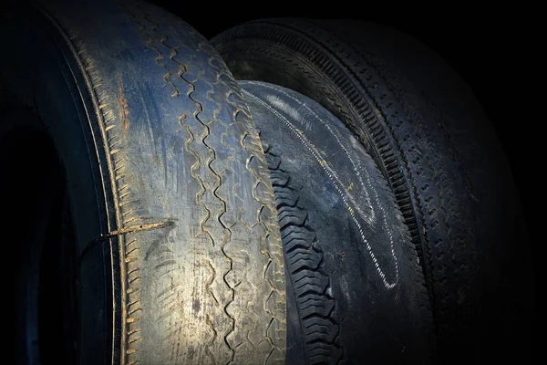 old worn damaged tires as pattern of damaged tire for advertising tire shop or car tire shop