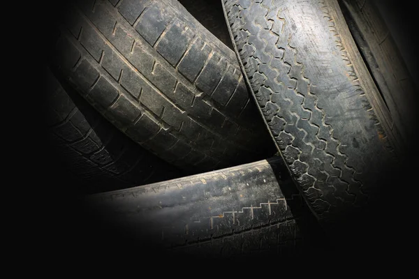 old worn damaged tires as pattern of damaged tire for advertising tire shop or car tire shop