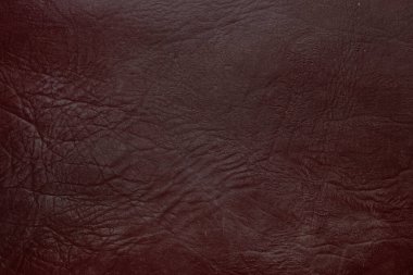 Beautiful red background with leather texture with red veins of red leather background as sample of red background from natural leather or sample of texture of leather for beautiful natural background