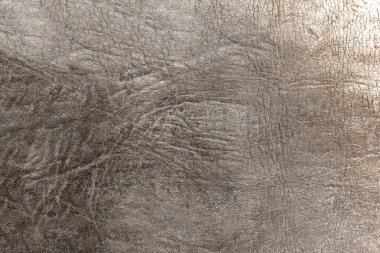 brown background with leather texture with brown veins of brown leather background as sample of brown background from natural leather or sample of texture of leather for beautiful natural background