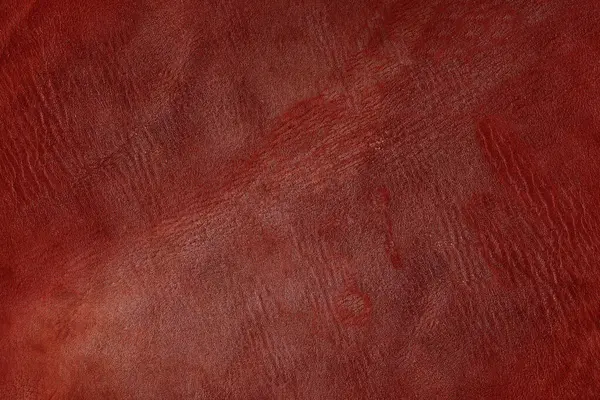 Güzel kırmızı arkaplan, hakiki deri desenli kırmızı deri arka planda koyu kırmızı deri ve arka planda açık kırmızı deri.