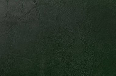 Yeşil deri damarları olan yeşil derili güzel yeşil arkaplan doğal deriden yeşil arkaplan örneği ya da güzel doğal arkaplan için deri dokusu örneği.