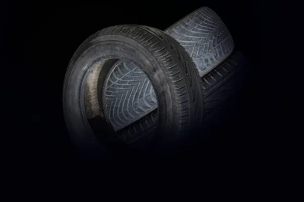 stock image old worn damaged tires isolated as pattern of damaged tire for advertising tire shop or car tire shop