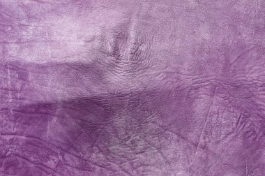 Güzel mor arkaplan, deri desenli, mor deri damarlı, doğal deriden alınmış mor arkaplan örneği ya da doğal arka plan için deri dokusu örneği.
