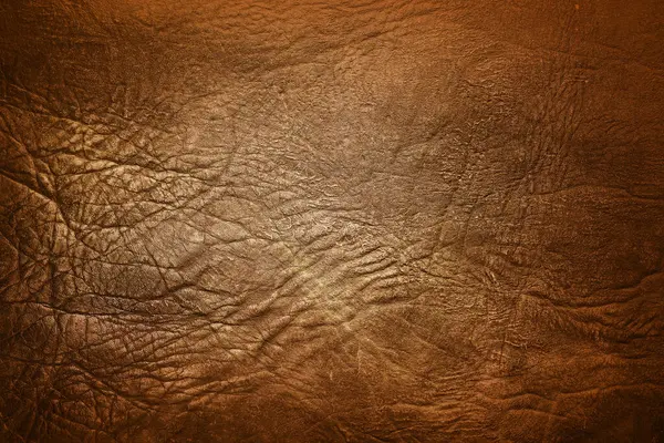 brown background with leather texture with brown veins of brown leather background as sample of brown background from natural leather or sample of texture of leather for beautiful natural background