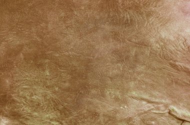 brown background with leather texture with brown veins of brown leather background as sample of brown background from natural leather or sample of texture of leather for beautiful natural background