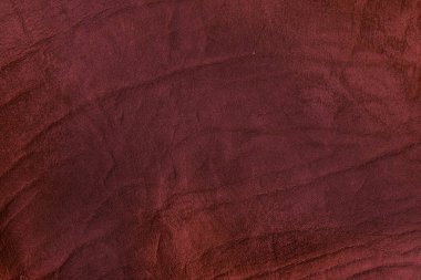 Beautiful red background with leather texture with red veins of red leather background as sample of red background from natural leather or sample of texture of leather for beautiful natural background