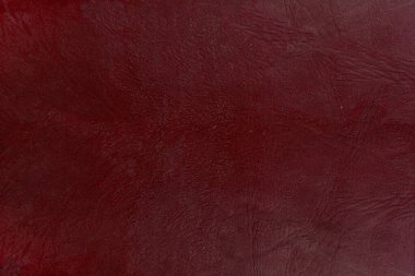 Beautiful red background with leather texture with red veins of red leather background as sample of red background from natural leather or sample of texture of leather for beautiful natural background