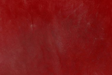 Beautiful red background with leather texture with red veins of red leather background as sample of red background from natural leather or sample of texture of leather for beautiful natural background