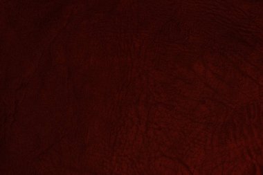 Beautiful red background with leather texture with red veins of red leather background as sample of red background from natural leather or sample of texture of leather for beautiful natural background