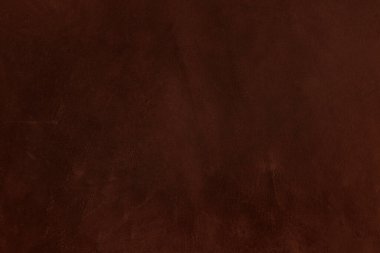 Beautiful red background with leather texture with red veins of red leather background as sample of red background from natural leather or sample of texture of leather for beautiful natural background
