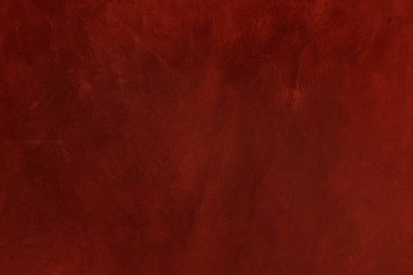 Beautiful red background with leather texture with red veins of red leather background as sample of red background from natural leather or sample of texture of leather for beautiful natural background