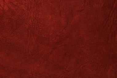 Beautiful red background with leather texture with red veins of red leather background as sample of red background from natural leather or sample of texture of leather for beautiful natural background