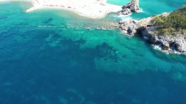 Sveti Nikola Saint Nicholas Island from drone in blue adriatic sea, Budva tourist resort, Montenegro