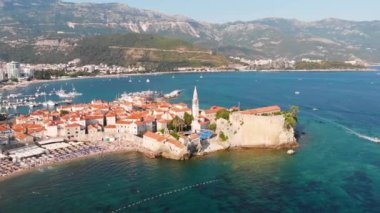 Aerial view of Budva, old and modern city on Adriatic Sea coast. Center of Montenegrin tourism and popular sea resort.