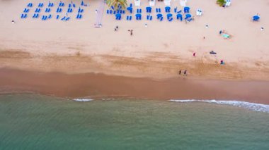 People activities and relax on sand beach Teresitas, Canary island