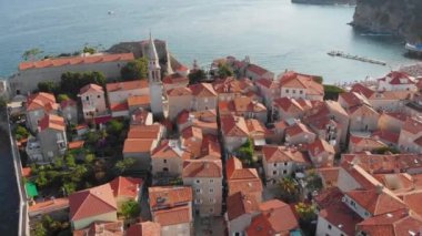 Aerial view of Budva, old and modern city on Adriatic Sea coast. Center of Montenegrin tourism and popular sea resort.