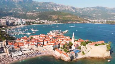 Aerial view of Budva, old and modern city on Adriatic Sea coast. Center of Montenegrin tourism and popular sea resort.