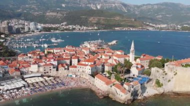 Aerial view of Budva, old and modern city on Adriatic Sea coast. Center of Montenegrin tourism and popular sea resort.
