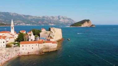 Aerial view of Budva, old and modern city on Adriatic Sea coast. Center of Montenegrin tourism and popular sea resort.