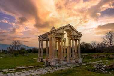 Famous Tetrapylon Gate in Aphrodisias ancient city. Archaeological and historical sites of modern Turkey clipart